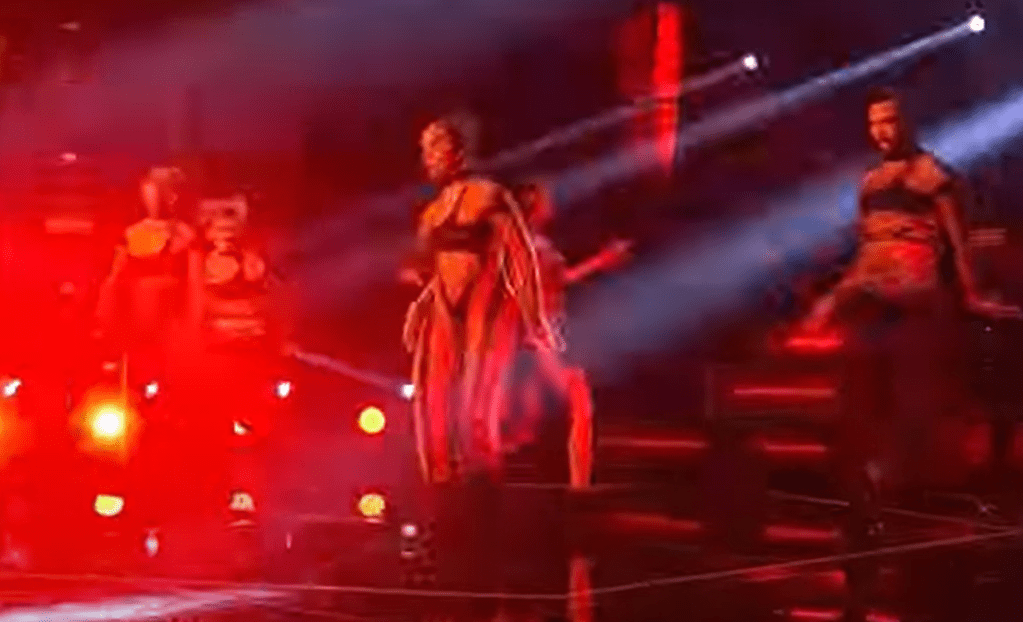 Ella walking off stage