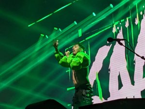 KAARIJAA with his hand raised